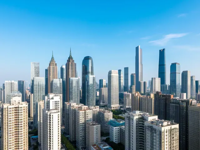 Panoramic cityscape with tall buildings under clear blue daylight