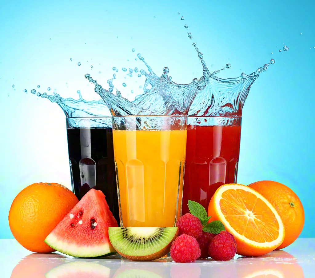 Colorful fruit juice splash with fresh ingredients