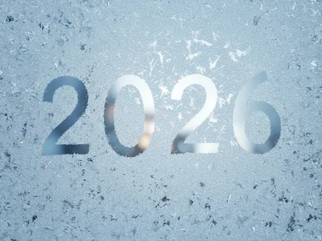 Gold 2026 numbers on a frosted icy textured background