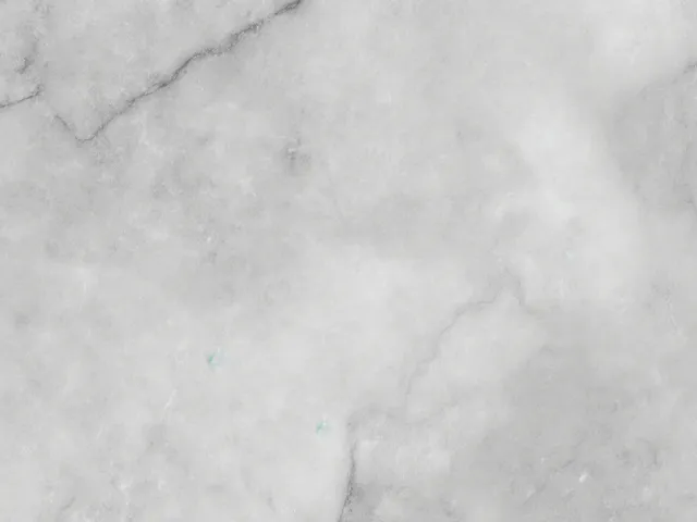 White and gray marble stone pattern close-up for interiors.