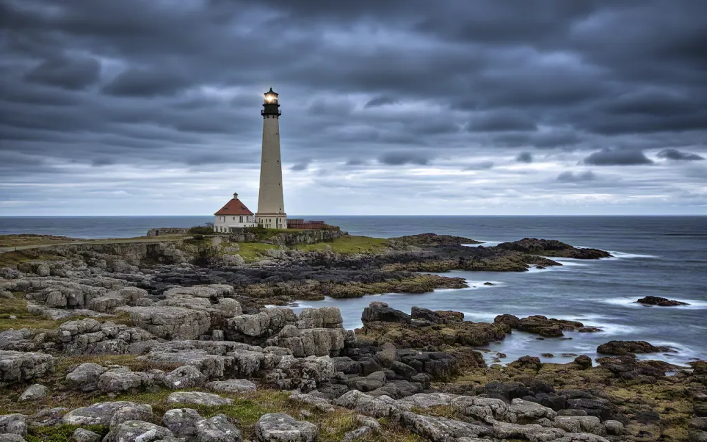 Lighthouse on stormy seashore