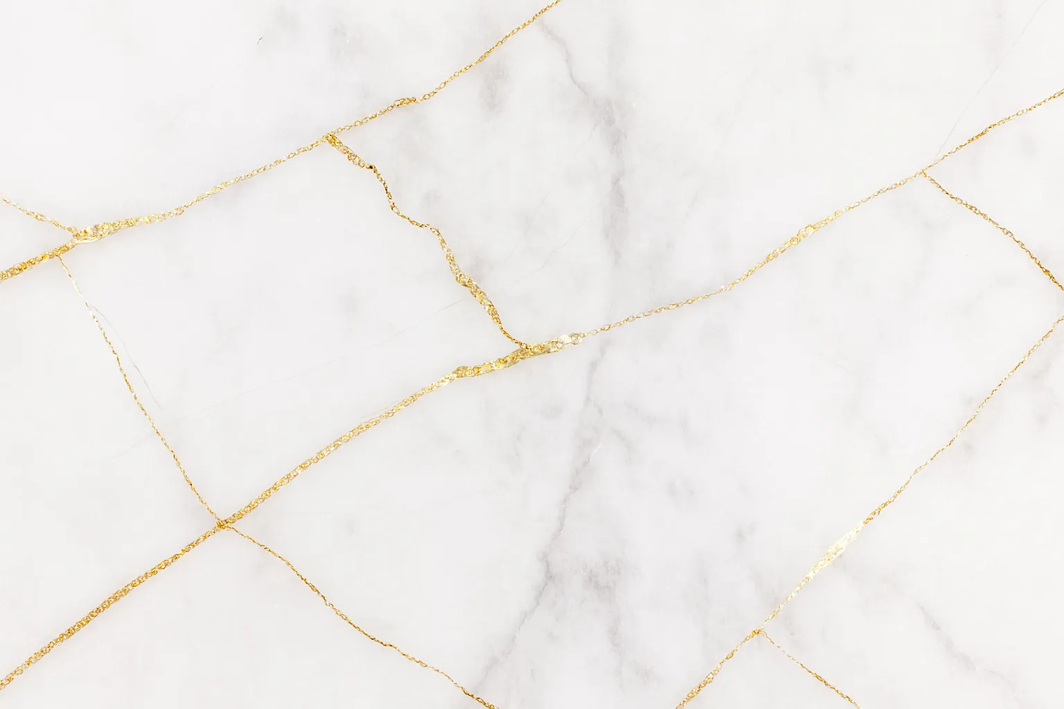 white marble background with gold veins
