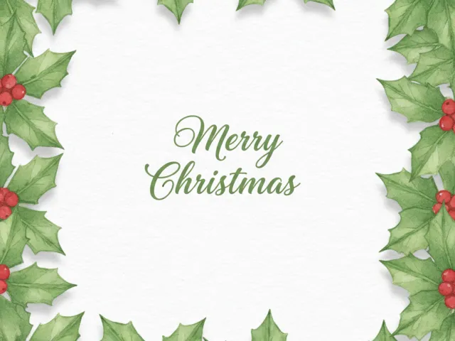 christmas greeting card with green holly leaves and red berries around text merry christmas