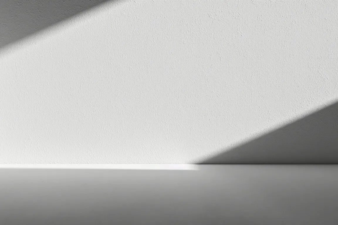 simple light grey background with diagonal soft shadows