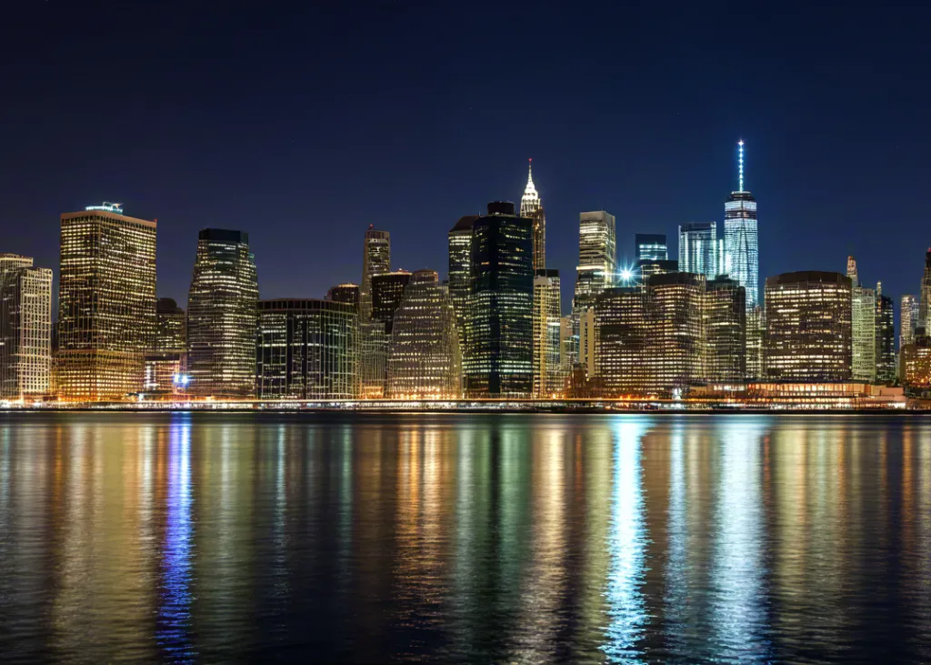 Modern city skyline illuminated at night