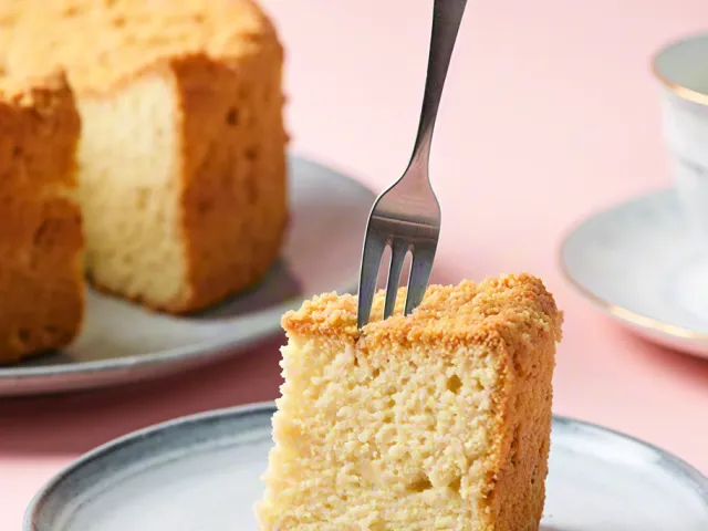 Tasty cake slice served with fork