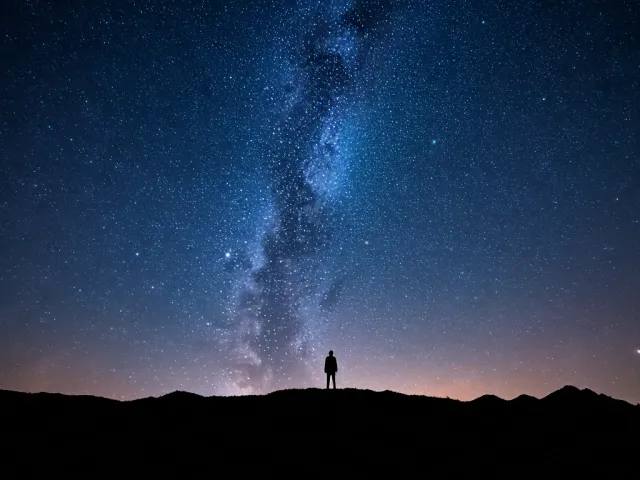 Milky Way night sky landscape with silhouette