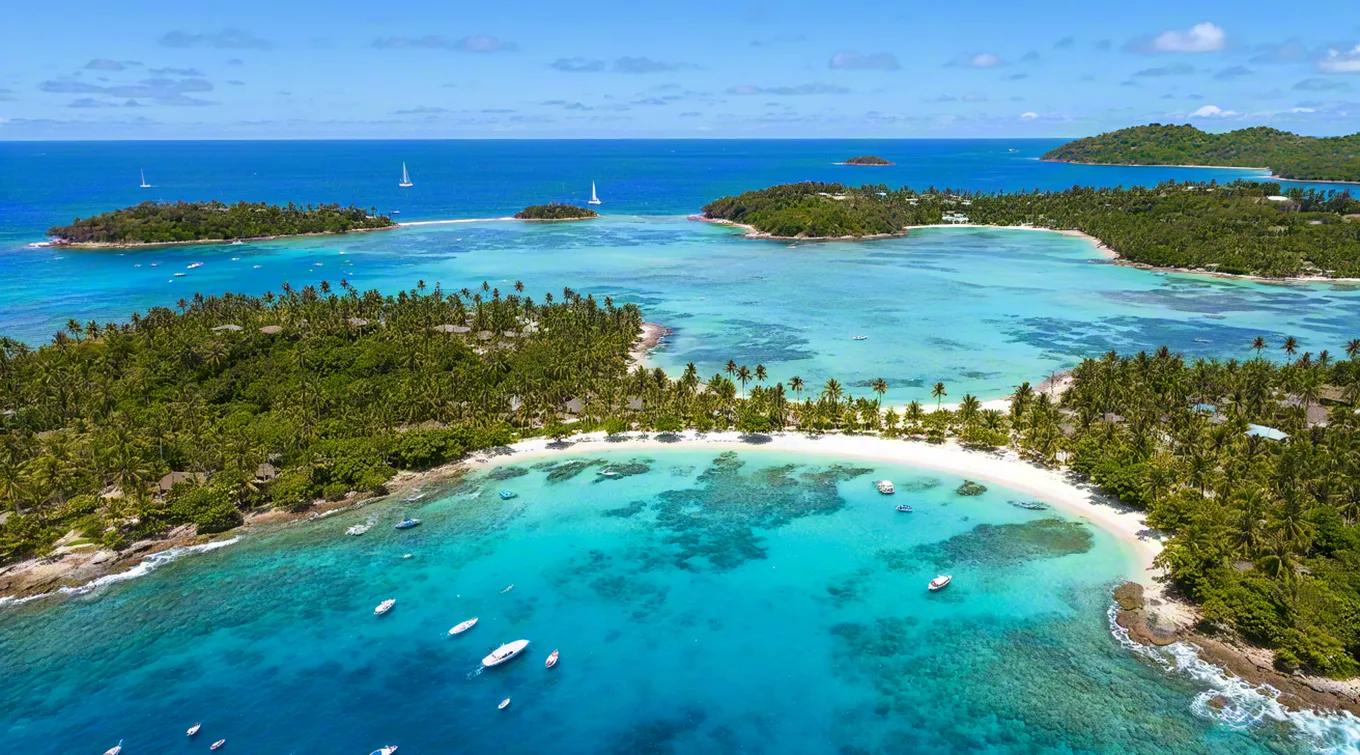 Aerial view of tropical island and blue lagoon