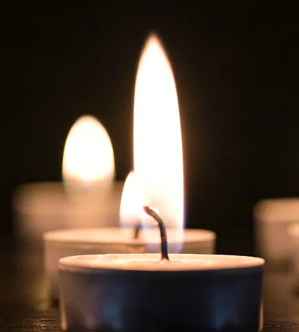 Candlelight reflections creating calm evening ambiance.