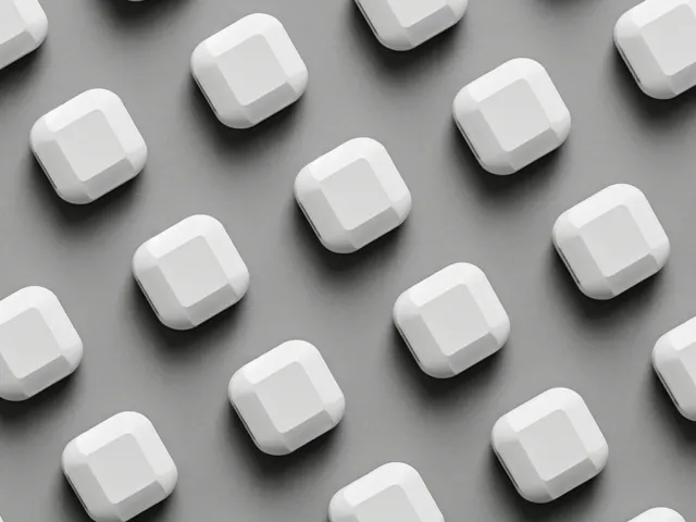 repeating white geometric blocks forming a 3D pattern