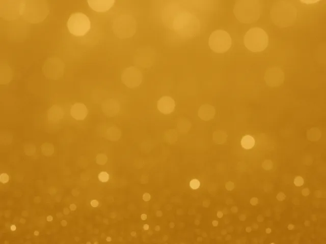 Shimmering bokeh background in warm golden tones
