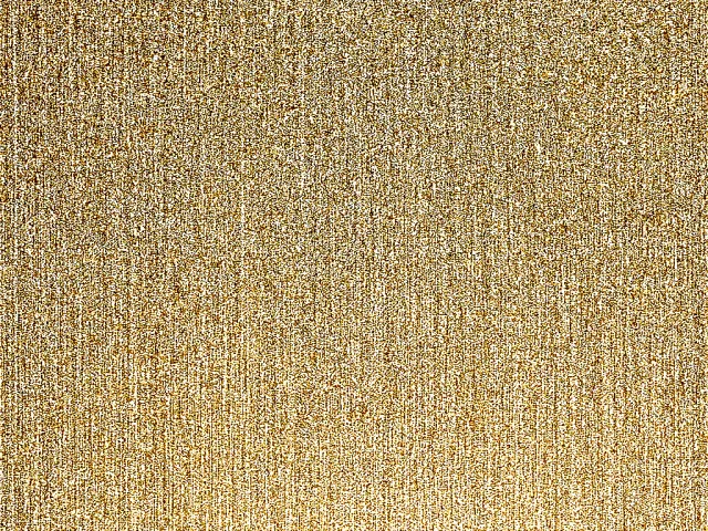 Detailed textured gold fabric surface for design and decorative use