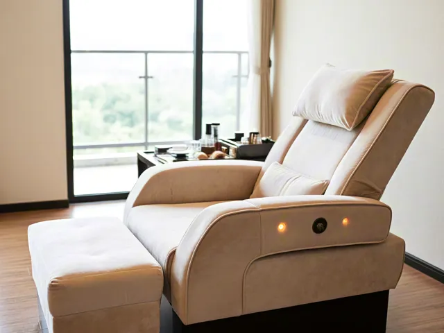 Comfortable spa recliner chair in bright modern wellness interior