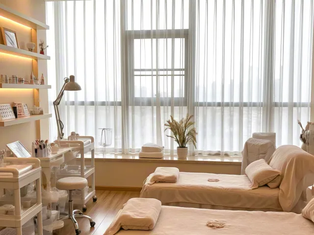 Elegant spa treatment room with warm lighting and minimal decor